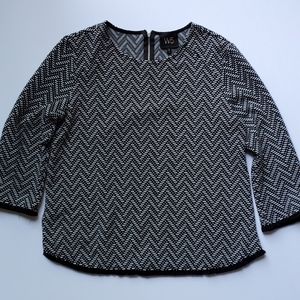 W5 3/4 sleeved medium shirt. Black and white.